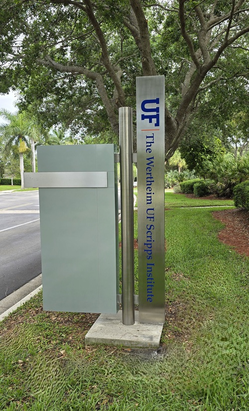 directional sign on post