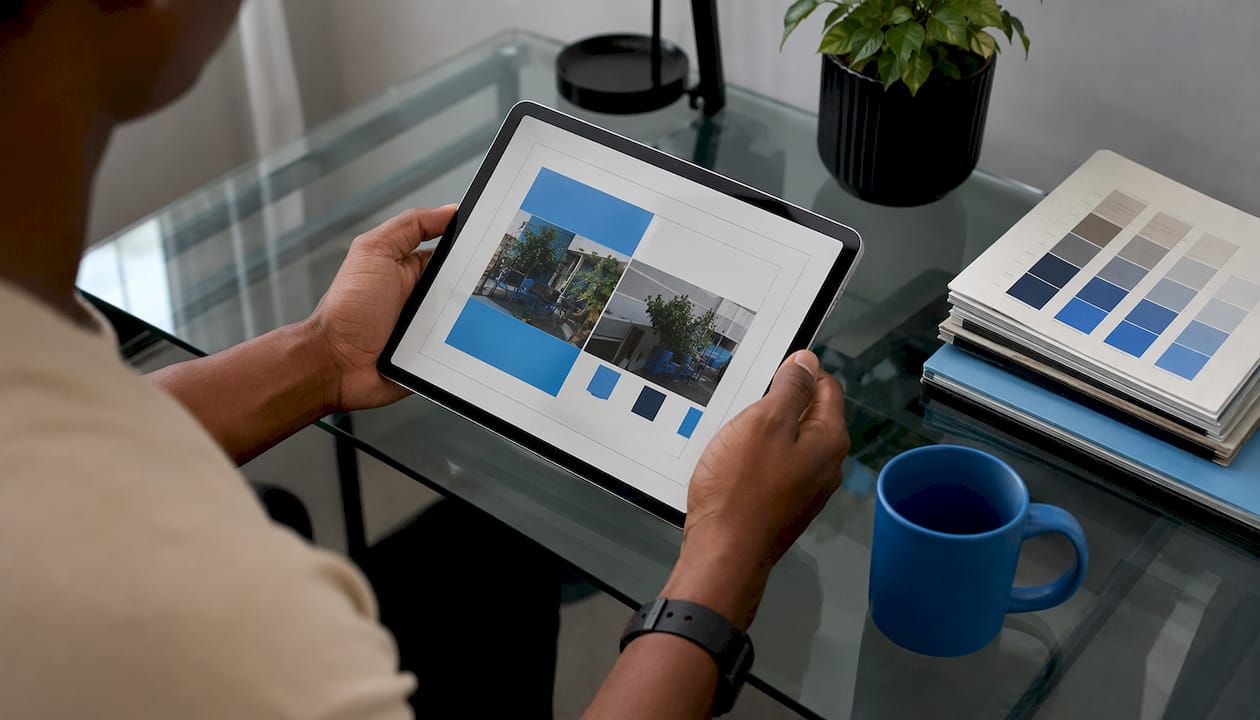Hands holding tablet with digital sign proof